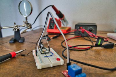 A breadboard with wires showing how powered Engineering prototypes automation systems